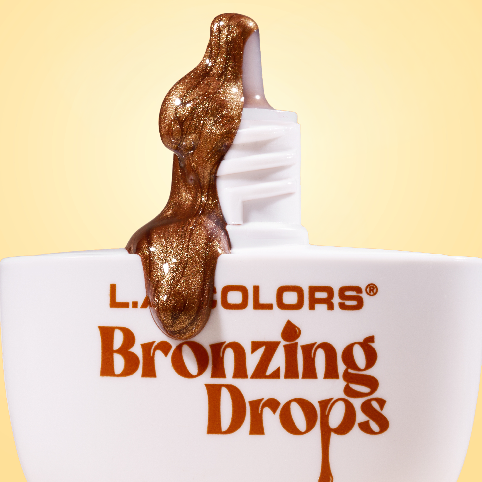 L.A. COLORS Bronzing Drops CFB233 Sundusk - lifestyle 01