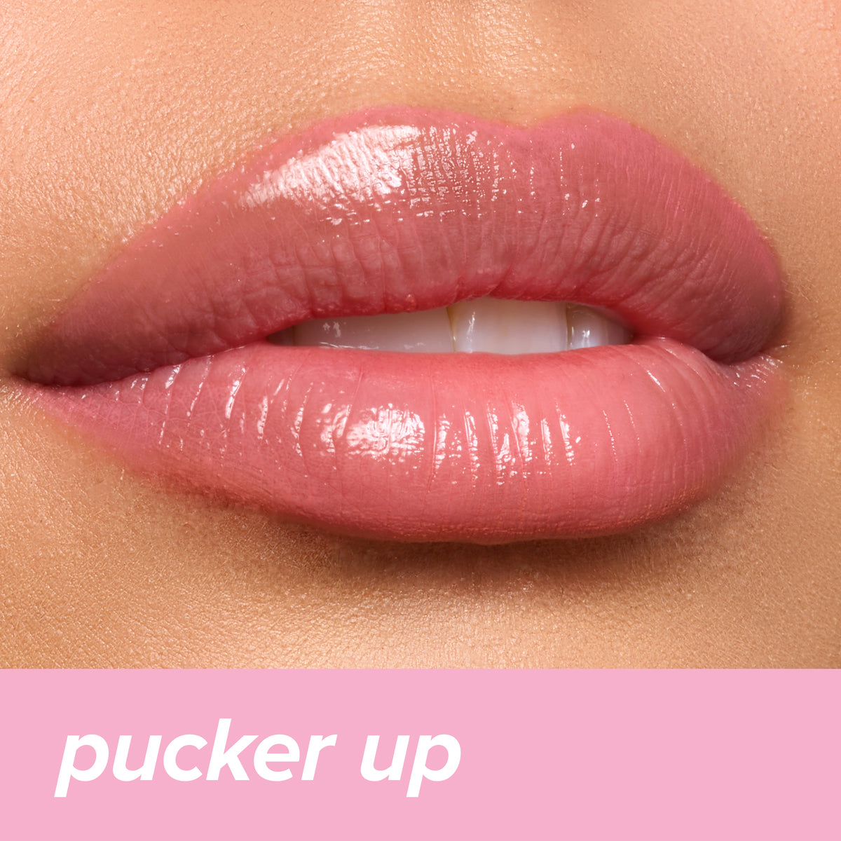 Thumbnail: Juicy Lips Tinted Lip Balm in Pucker Up — pink glossy finish on lips