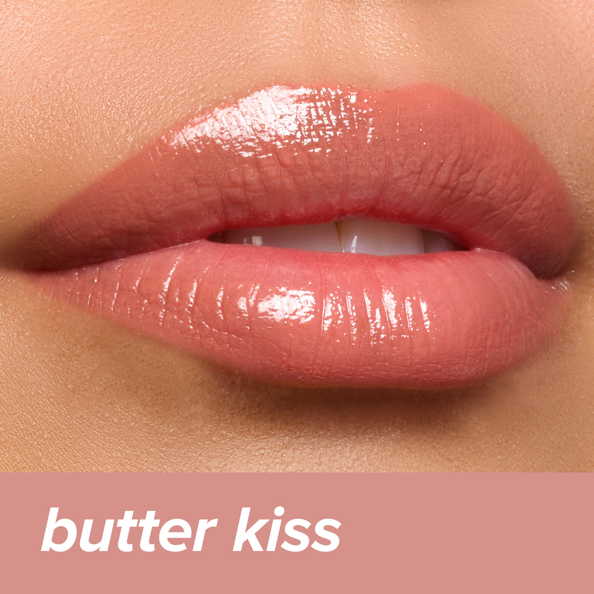 Thumbnail: Juicy Lips Tinted Lip Balm in Butter Kiss — rosy nude glossy finish on lips