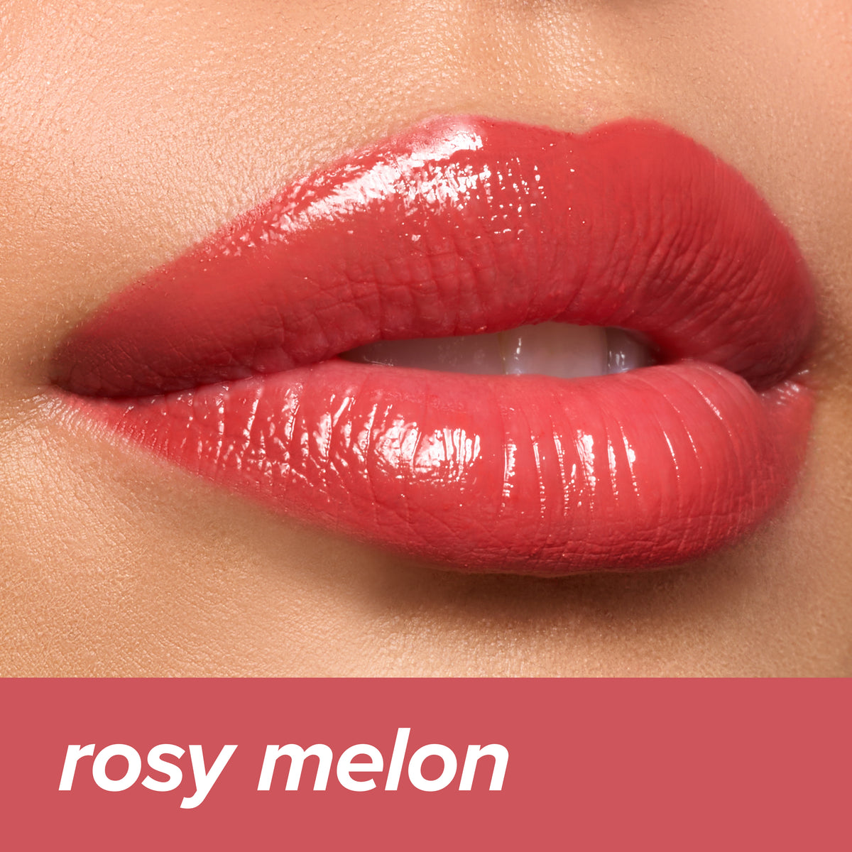 Juicy Lips Tinted Lip Balm in Rosy Melon — rosy coral glossy finish on lips
