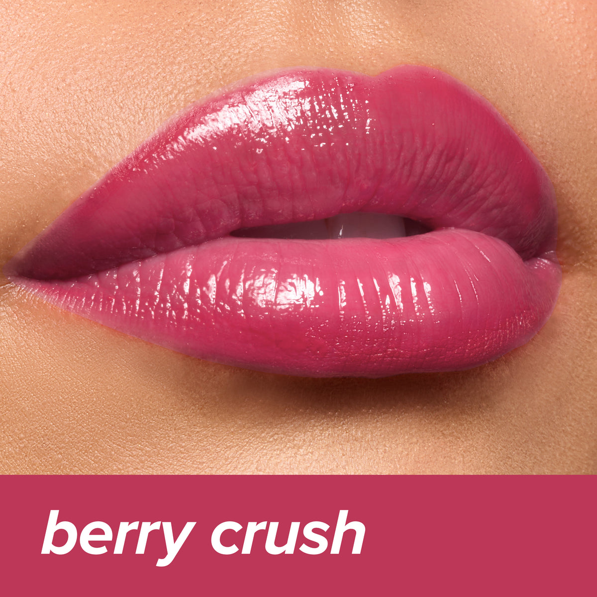 Thumbnail: Juicy Lips Tinted Lip Balm in Berry Crush — bright berry-pink glossy finish on lips