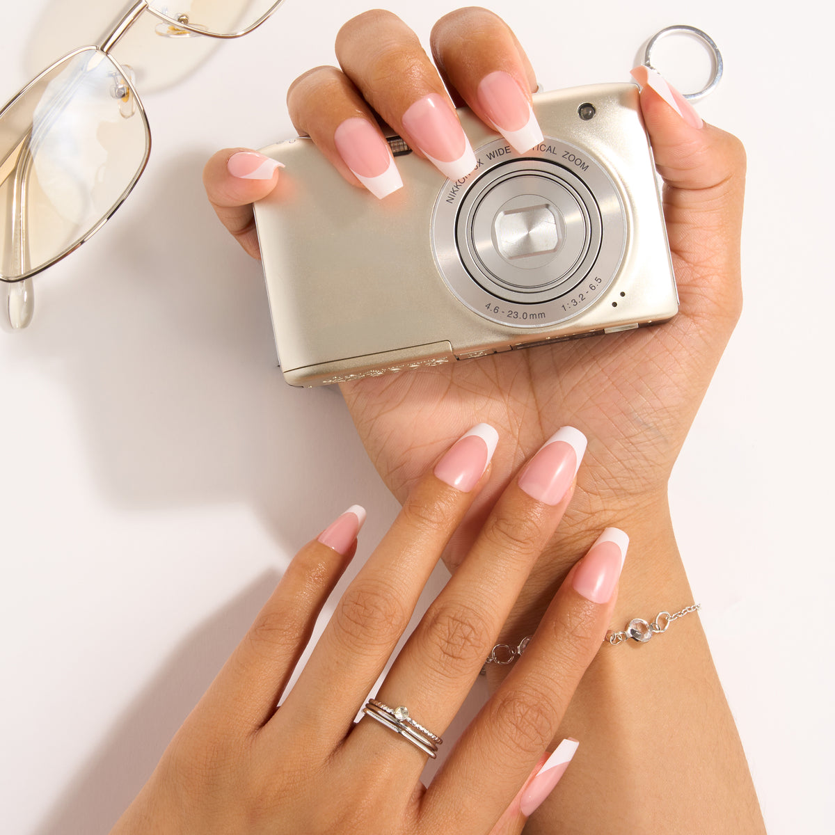 Thumbnail: French Press Mani Nail Tip Kit — Oh La La French-tip manicure lifestyle image