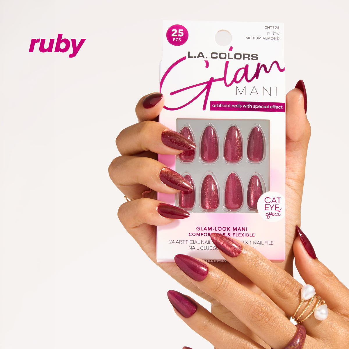 L.A. Colors Glam Mani Nail Tips in Ruby (CNT775): 25-piece pack of glam-look artificial nail tips held in hand.