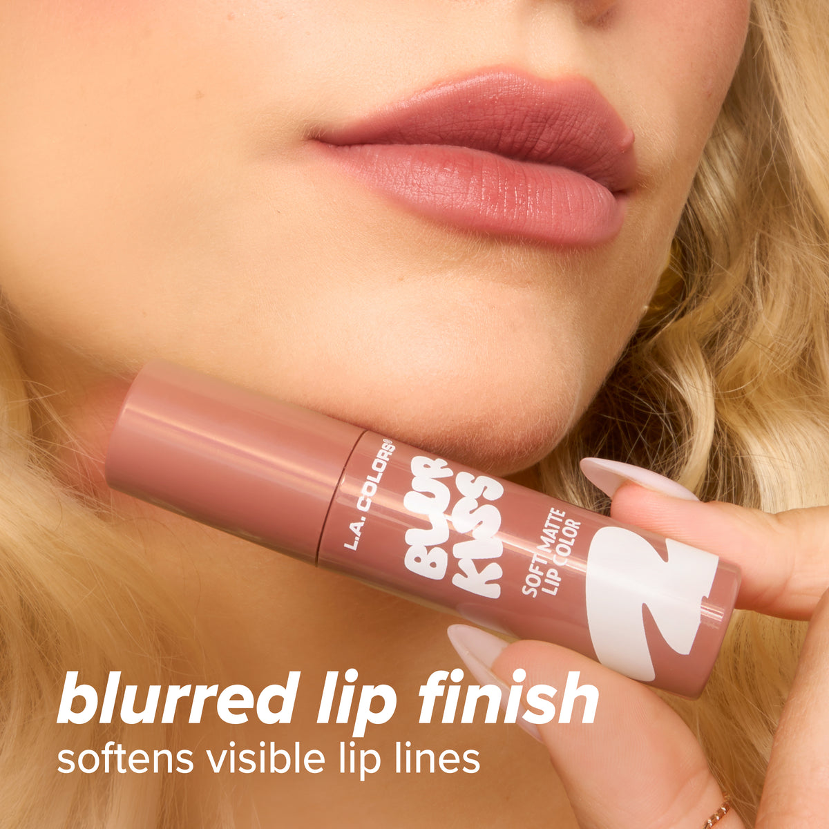 Thumbnail: Model holding L.A. Colors Blur Kiss Soft Matte Lip Color near her chin. Text: blurred lip finish, softens visible lip lines.