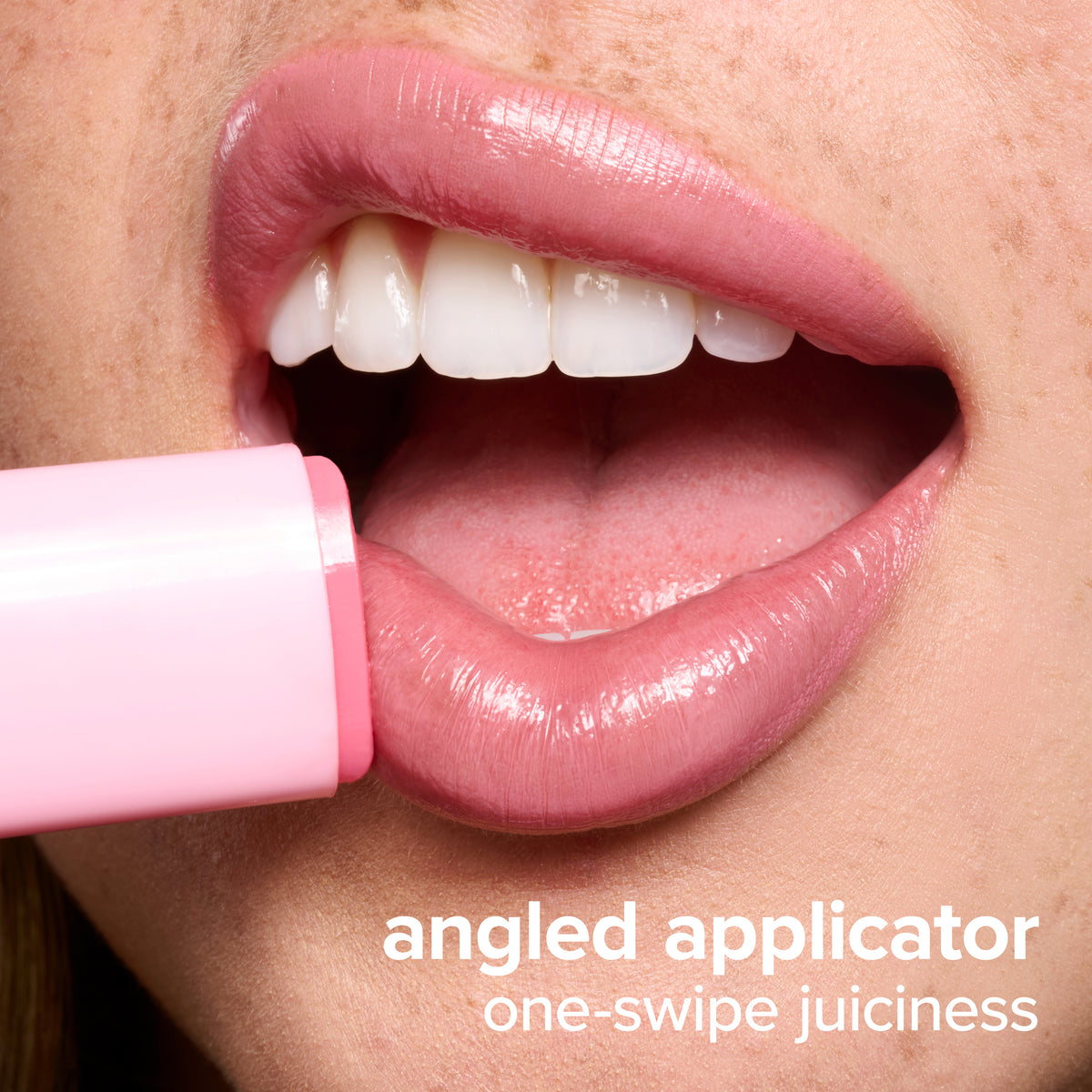 Thumbnail: Juicy Lips Tinted Lip Balm — angled applicator gliding across the lower lip